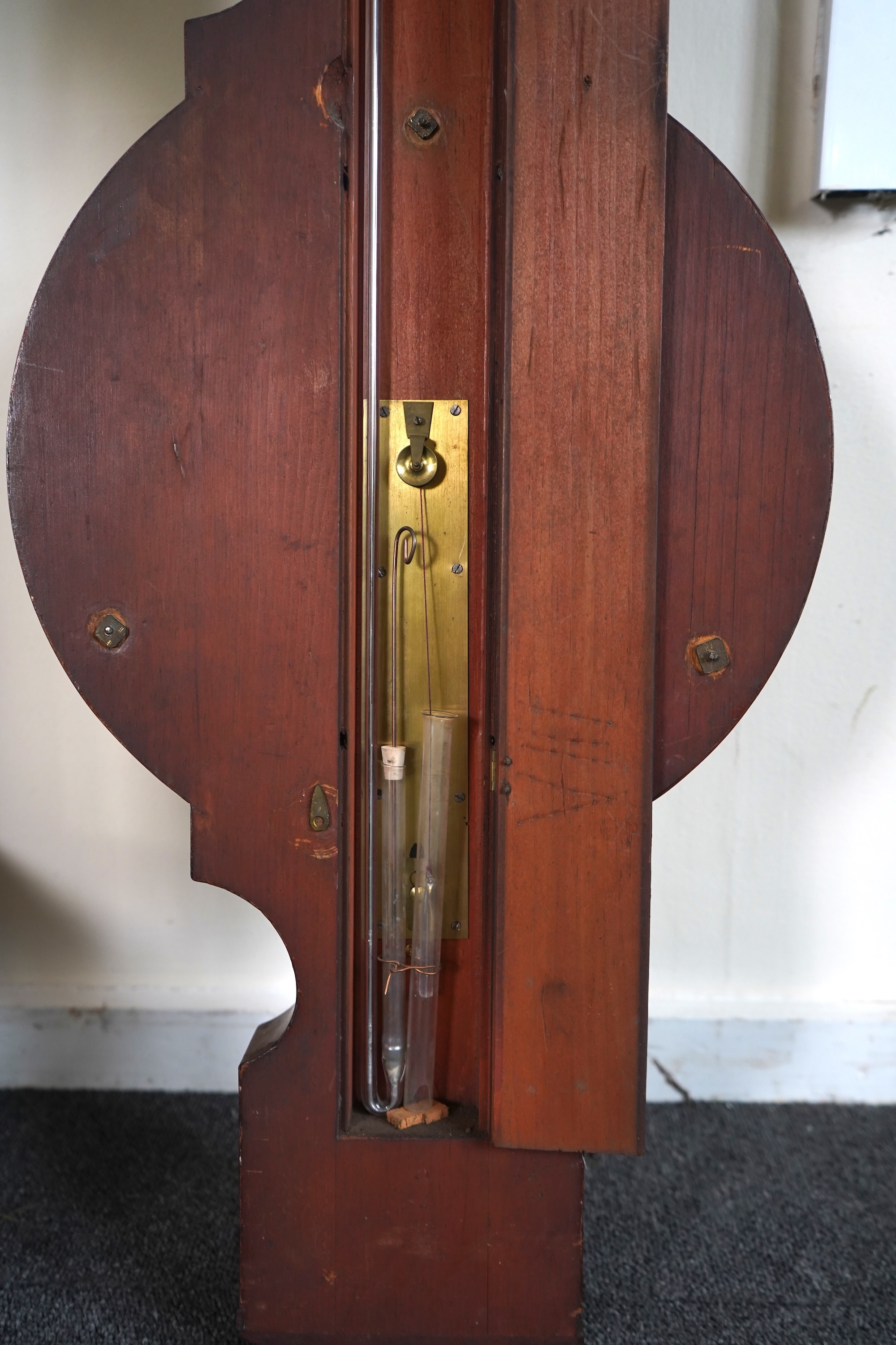 A large mid 19th century tulipwood banded mahogany wheel barometer, by C. Rimondi, Halifax
